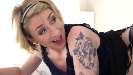 Tattooed blonde mature, Julie Holly likes the way a handsome guy is fucking her brains out