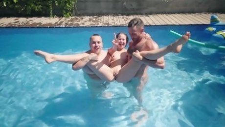 Special treat for a teen slut in outdoor pool orgy