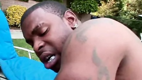 Black stud fucks curvy black slut on a lawn chair